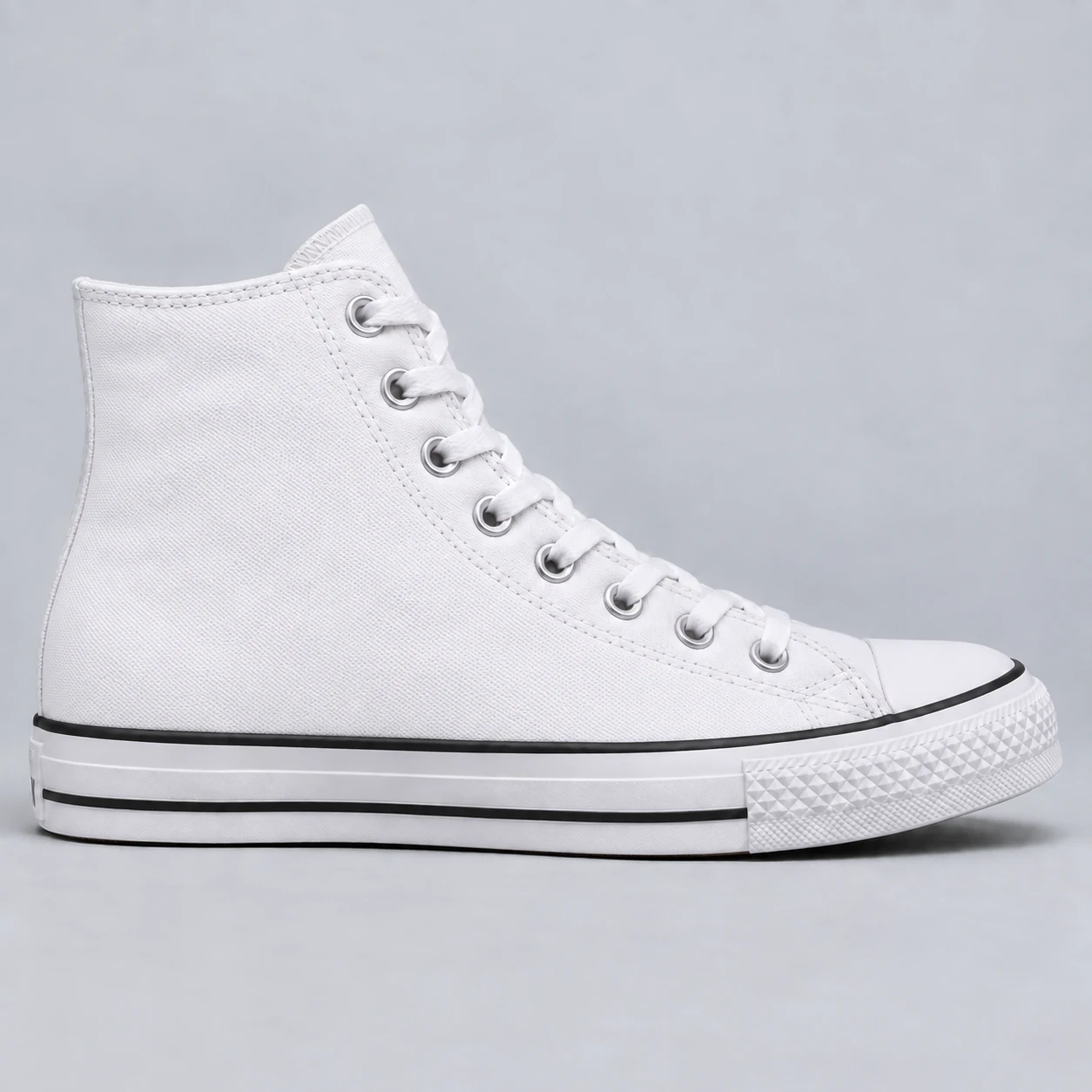 Plain white canvas high-top sneaker before customization
