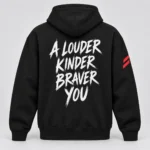 Black SPEAK//UP hoodie, back view with white A Louder Kinder Braver You lettering and red stripes on the right sleeve