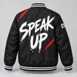 Black SPEAK//UP statement jacket with white Speak Up brush lettering and red back accents, rear view