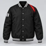 Black SPEAK//UP varsity bomber jacket with red shoulder artwork, an arrow sleeve patch and striped ribbing, front view